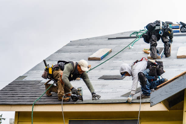 Professional Gutter Installation technician working in Hathorne, MA